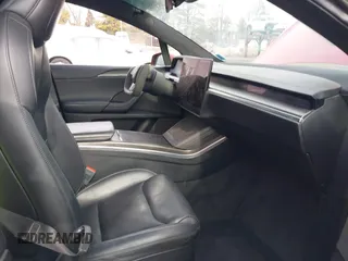 2022 Tesla Model X Plaid with VIN 7SAXCBE60NF330246, listed as a IAAI auction lot 41477394 with 51,612 mi miles and . Bid and sale history available at carsss.com. Image 5.