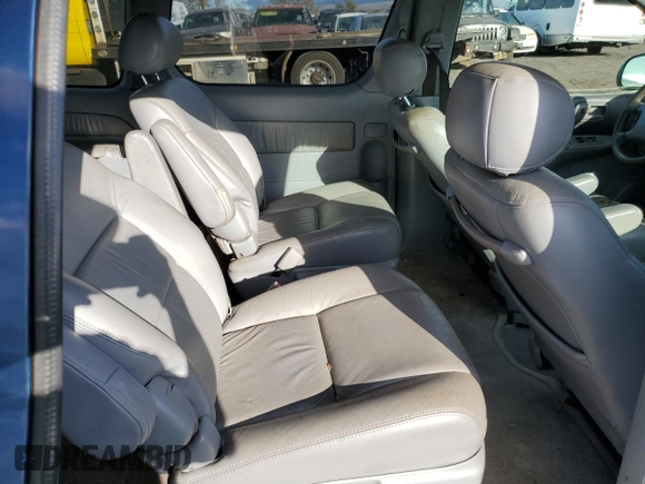 2001 Toyota Sienna LE with VIN 4T3ZF13C91U355926, listed as a Copart auction lot 88992805 with 130,397 mi miles and Salvage title. Bid and sale history available at DreamBid. Image 11.