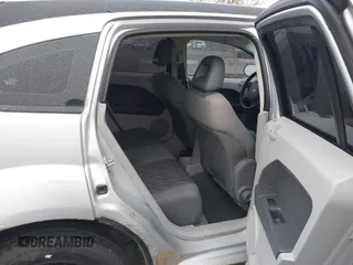 2007 Dodge Caliber SXT with VIN 1B3HB48BX7D379555, listed as a IAAI auction lot 42022554 with 99,670 mi miles and . Bid and sale history available at DreamBid. Image 8.