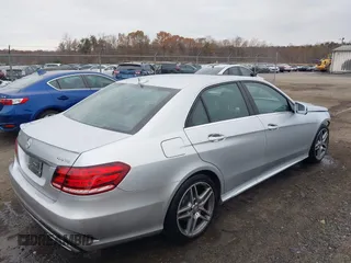 2014 Mercedes-Benz E 350 Luxury with VIN WDDHF8JB0EB075945, listed as a IAAI auction lot 41018546 with 66,678 mi miles and . Bid and sale history available at DreamBid. Image 4.