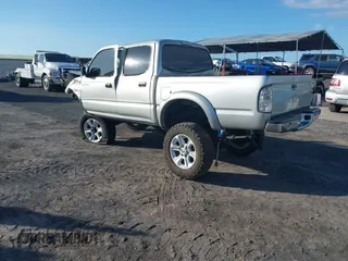 2002 Toyota Tacoma PreRunner with VIN 5TEGN92N42Z005511, listed as a IAAI auction lot 41313457 with Not Provided miles and . Bid and sale history available at DreamBid. Image 3.