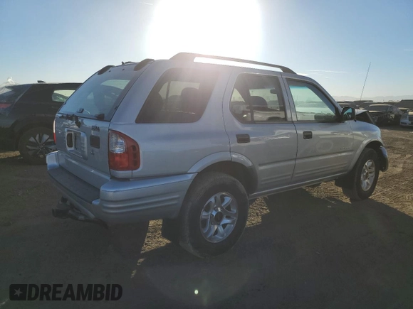 2003 Isuzu Rodeo with VIN 4S2DM58W734305363, listed as a Copart auction lot 85539774 with 219,300 mi miles and Salvage title. Bid and sale history available at DreamBid. Image 3.