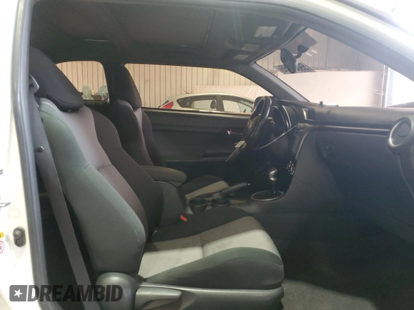 2016 Scion tC z VIN JTKJF5C73GJ024430, wystawiony jako Copart lot #59889055 z przebiegiem 142 532 mil mil oraz Szkoda całkowita • Salvage title. Historia ofert i sprzedaży dostępna na DreamBid. Obrazek 10.