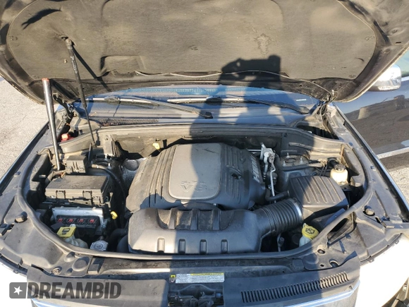2011 Jeep Grand Cherokee Overland with VIN 1J4RS6GT5BC648076, listed as a Copart auction lot 48878135 with 223,263 mi miles and Salvage Title. Bid and sale history available at DreamBid. Image 11.