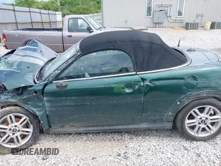 2013 MINI Roadster S z VIN WMWSY3C55DT566134, wystawiony jako IAAI lot #42265800 z przebiegiem Nie podano mil oraz . Historia ofert i sprzedaży dostępna na DreamBid. Obrazek 14.