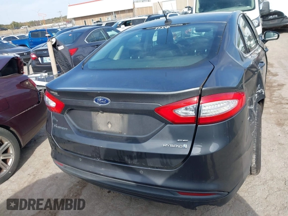 2015 Ford Fusion SE Hybrid with VIN 3FA6P0LUXFR266743, listed as a IAAI auction lot 40862039 with 116,610 mi miles. Bid and sale history available at carsss.com. Image 16.