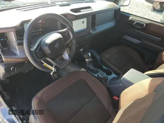 2023 Ford Bronco with VIN 1FMDE5CH0PLB19978, listed as a Copart auction lot 70308774 with 4,303 mi miles and Salvage Title. Bid and sale history available at carsss.com. Image 8.