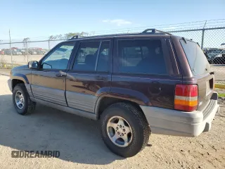 1998 Jeep Grand Cherokee Laredo with VIN 1J4FX58SXWC144715, listed as a Copart auction lot 86423594 with 93,936 mi miles and Clean Title. Bid and sale history available at carsss.com. Image 2.