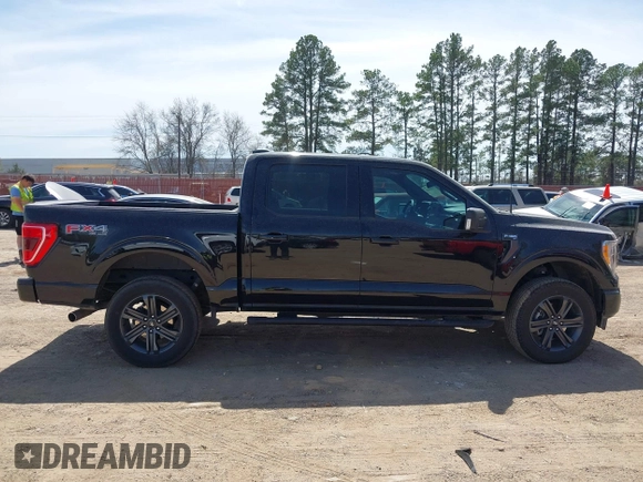 2023 Ford F-150 XL with VIN 1FTFW1E88PKG19831, listed as a IAAI auction lot 41828589 with 12,786 mi miles and . Bid and sale history available at carsss.com. Image 14.