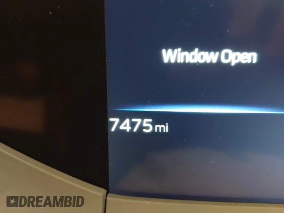 2024 Toyota Prius LE with VIN JTDADABU8R3013976, listed as a IAAI auction lot 41621800 with 7,475 mi miles and . Bid and sale history available at DreamBid. Image 7.