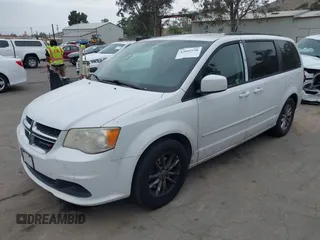 2014 Dodge Grand Caravan SXT with VIN 2C4RDGCG1ER304836, listed as a IAAI auction lot 42049558 with 186,831 mi miles and . Bid and sale history available at DreamBid. Image 2.