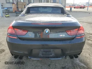 2016 BMW M6 z VIN WBS6G9C57GD932144, wystawiony jako Copart lot #72273744 z przebiegiem 71 614 mil mil oraz Szkoda całkowita • Salvage title. Historia ofert i sprzedaży dostępna na DreamBid. Obrazek 6.