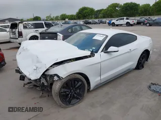 2017 Ford Mustang EcoBoost with VIN 1FA6P8TH3H5356890, listed as a IAAI auction lot 41929409 with 82,766 mi miles and . Bid and sale history available at DreamBid. Image 2.