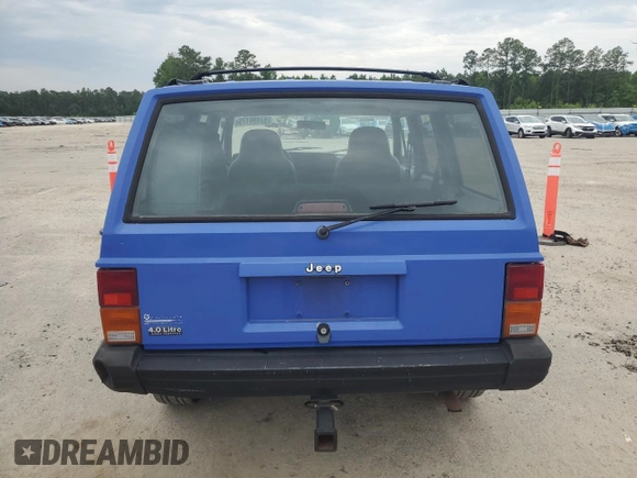 1996 Jeep Cherokee Sport z VIN 1J4FT68S8TL128381, wystawiony jako Copart lot #57496175 z przebiegiem 221 330 mil mil oraz Szkoda całkowita • Salvage title. Historia ofert i sprzedaży dostępna na DreamBid. Obrazek 6.