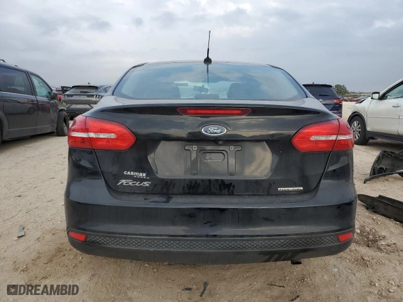 2016 Ford Focus S with VIN 1FADP3E22GL297232, listed as a Copart auction lot 45947005 with 105,497 mi miles and Salvage Title. Bid and sale history available at carsss.com. Image 6.