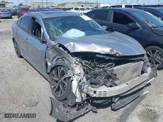 2018 Honda Civic Si Sedan with VIN 2HGFC1E52JH705151, listed as a IAAI auction lot 41673195 with NaN miles. Bid and sale history available at carsss.com. Image 1.
