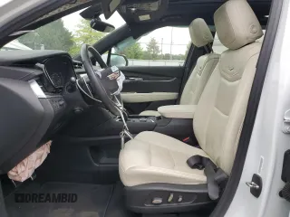 2022 Cadillac XT6 Sport with VIN 1GYKPGRS4NZ174846, listed as a Copart auction lot 64271474 with 57,891 mi miles and Salvage Title. Bid and sale history available at carsss.com. Image 7.