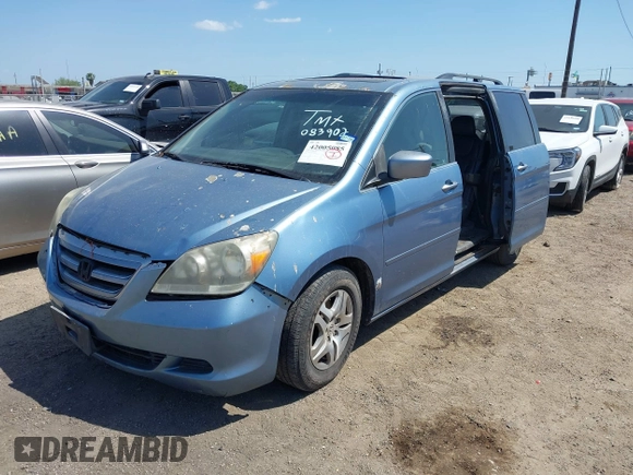2005 Honda Odyssey EX-L with VIN 5FNRL387X5B083902, listed as a IAAI auction lot 42005085 with 249,861 mi miles. Bid and sale history available at carsss.com. Image 2.