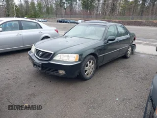 2002 Acura RL with VIN JH4KA96542C005442, listed as a IAAI auction lot 41951402 with 211,734 mi miles. Bid and sale history available at carsss.com. Image 2.