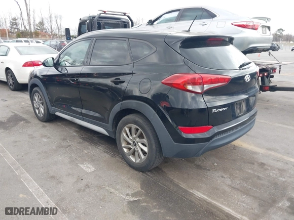 2017 Hyundai Tucson SE Plus with VIN KM8J33A49HU584557, listed as a IAAI auction lot 41853951 with 105,602 mi miles. Bid and sale history available at carsss.com. Image 3.