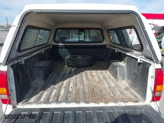 1999 Chevrolet Silverado 1500 with VIN 1GCEC14W2XE158287, listed as a IAAI auction lot 41829042 with NaN miles. Bid and sale history available at carsss.com. Image 8.