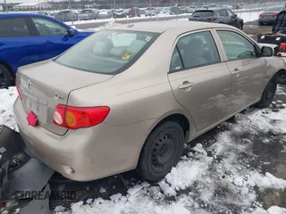 2009 Toyota Corolla with VIN 1NXBU40E19Z052903, listed as a IAAI auction lot 41305719 with 141,625 mi miles and . Bid and sale history available at carsss.com. Image 4.