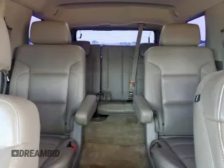 2015 Chevrolet Tahoe LTZ z VIN 1GNSCCKC8FR102859, wystawiony jako Copart lot #56755555 z przebiegiem 167 191 mil mil oraz Czysty tytuł • Clean title. Historia ofert i sprzedaży dostępna na DreamBid. Obrazek 10.