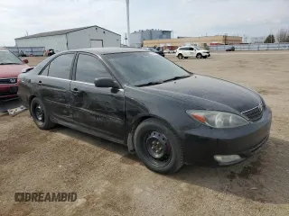 2004 Toyota Camry LE with VIN JTDBE32K940288536, listed as a Copart auction lot 54106555 with 246,661 mi miles and Clean Title. Bid and sale history available at DreamBid. Image 4.
