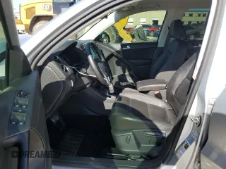 2017 Volkswagen Tiguan S with VIN WVGAV7AX3HK008793, listed as a Copart auction lot 54086385 with 82,400 mi miles and Salvage Title. Bid and sale history available at DreamBid. Image 7.