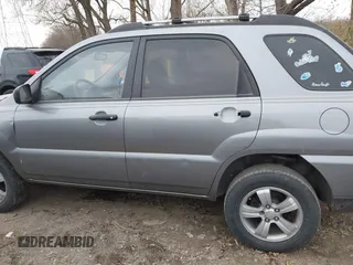 2009 Kia Sportage LX with VIN KNDJF724997570871, listed as a IAAI auction lot 41003267 with 231,654 mi miles and . Bid and sale history available at carsss.com. Image 14.