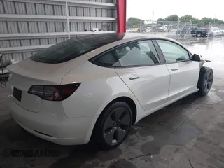 2023 Tesla Model 3 with VIN 5YJ3E1EA9PF548726, listed as a IAAI auction lot 42345157 with 30,647 mi miles and . Bid and sale history available at DreamBid. Image 4.