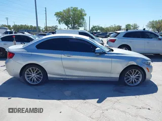 2015 BMW 2 Series 228i with VIN WBA1F5C58FV257570, listed as a IAAI auction lot 41783929 with 229,893 mi miles. Bid and sale history available at carsss.com. Image 13.