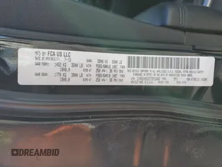 2015 Dodge Durango SXT with VIN 1C4RDHAG2FC931046, listed as a Copart auction lot 52409775 with 164,509 mi miles and Salvage title. Bid and sale history available at DreamBid. Image 13.