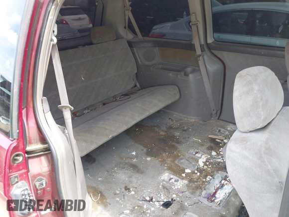 2002 Honda Odyssey EX with VIN 5FNRL18612B028570, listed as a IAAI auction lot 42491201 with 203,401 mi miles and . Bid and sale history available at DreamBid. Image 8.