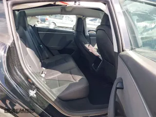 2024 Tesla Model 3 with VIN 5YJ3E1EA0RF873378, listed as a IAAI auction lot 41712908 with 4,653 mi miles. Bid and sale history available at carsss.com. Image 8.