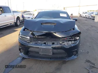2019 Dodge Charger GT with VIN 2C3CDXHGXKH597477, listed as a IAAI auction lot 41840022 with 81,671 mi miles and . Bid and sale history available at DreamBid. Image 6.
