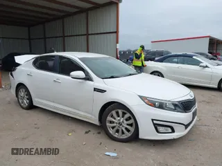 2015 Kia Optima LX with VIN KNAGM4A76F5619975, listed as a IAAI auction lot 41620385 with 174,454 mi miles. Bid and sale history available at carsss.com. Image 1.