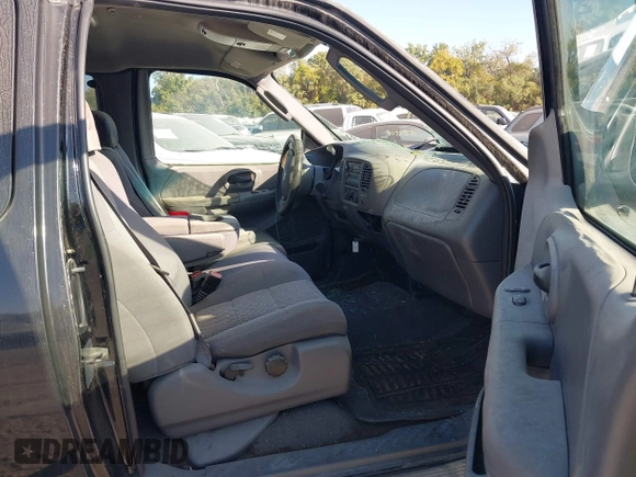 2003 Ford F-150 XL with VIN 1FTRX07W63KD30974, listed as a IAAI auction lot 40609687 with 208,378 mi miles and . Bid and sale history available at DreamBid. Image 5.