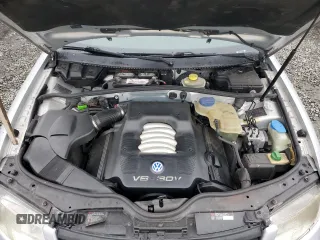 2000 Volkswagen Passat z VIN WVWPD23B0YP431209, wystawiony jako Copart lot #84954554 z przebiegiem 149 382 mil mil oraz Szkoda całkowita • Salvage title. Historia ofert i sprzedaży dostępna na DreamBid. Obrazek 11.