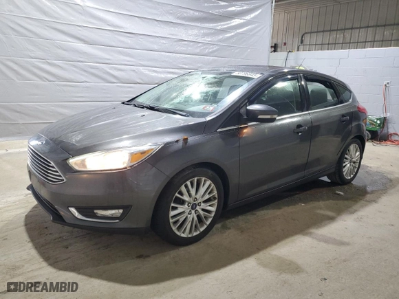 2015 Ford Focus Titanium with VIN 1FADP3N2XFL321128, listed as a Copart auction lot 50796845 with 156,700 mi miles and Clean Title. Bid and sale history available at carsss.com. Image 1.