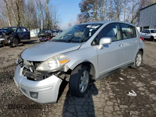 2009 Nissan Versa SL with VIN 3N1BC13E49L389676, listed as a Copart auction lot 58023675 with 203,412 mi miles and Salvage title. Bid and sale history available at DreamBid. Image 1.