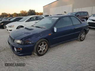 2000 Subaru Impreza RS with VIN JF1GM6755YG402080, listed as a Copart auction lot 79928674 with Not provided miles and Clean title. Bid and sale history available at DreamBid. Image 1.
