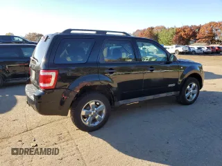 2008 Ford Escape XLT with VIN 1FMCU93168KD23345, listed as a Copart auction lot 77482674 with 142,607 mi miles and Clean title. Bid and sale history available at DreamBid. Image 3.