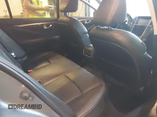 2014 Infiniti Q50 Premium z VIN JN1BV7AR7EM696486, wystawiony jako IAAI lot #41976047 z przebiegiem 145 000 mil mil oraz . Historia ofert i sprzedaży dostępna na DreamBid. Obrazek 8.