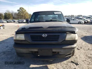 1999 Mazda B-Series 2WD Truck SX with VIN 4F4YR12C1XTM30111, listed as a Copart auction lot 81232584 with 167,752 mi miles and Clean Title. Bid and sale history available at carsss.com. Image 5.