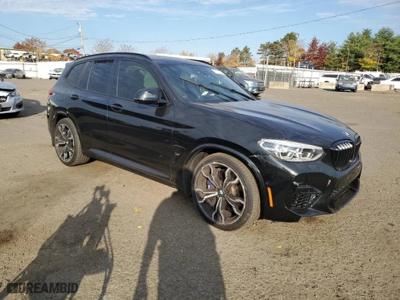 2020 BMW X3 M Competition with VIN 5YMTS0C05L9B85627, listed as a Copart auction lot 77110084 with NaN miles and Salvage Title. Bid and sale history available at carsss.com. Image 4.