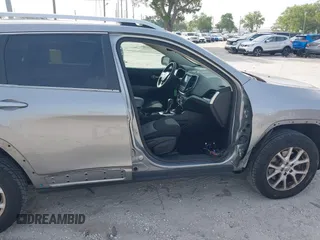 2014 Jeep Cherokee Altitude with VIN 1C4PJMCB4EW107556, listed as a IAAI auction lot 41881448 with 212,816 mi miles and . Bid and sale history available at carsss.com. Image 6.