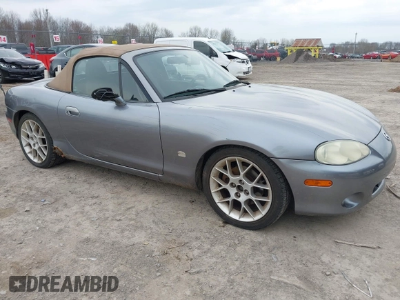 2002 Mazda MX-5 Miata Cloth z VIN JM1NB353X20227591, wystawiony jako IAAI lot #42066430 z przebiegiem 79 585 mil mil oraz . Historia ofert i sprzedaży dostępna na DreamBid. Obrazek 1.