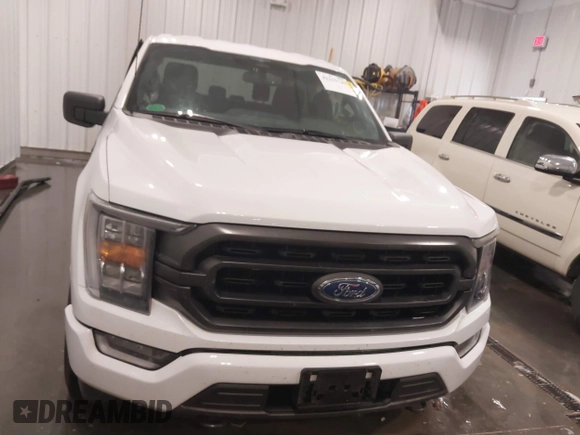 2023 Ford F-150 XL z VIN 1FTFW1E85PFA54558, wystawiony jako IAAI lot #42215749 z przebiegiem 22 476 mil mil oraz . Historia ofert i sprzedaży dostępna na DreamBid. Obrazek 13.