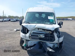 2019 Ford Transit Passenger XL с VIN 1FBAX2CM3KKB43496, выставлен на аукционе IAAI как лот 42050162 с пробегом 98 459 миль миль и . История ставок и продаж доступна на DreamBid. Изображение 13.
